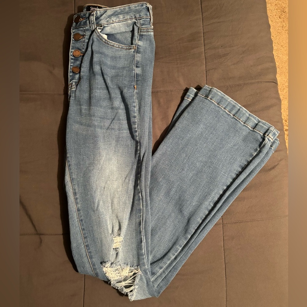 Light denim, distressed bootcut jeans